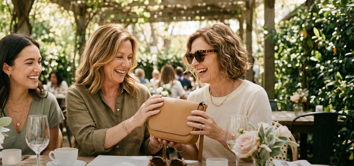 Three friends sharing a table outdoors
